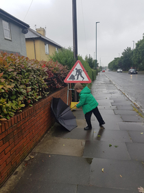 My son doing what the sign says haha