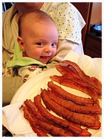 My son smelling bacon for the first time