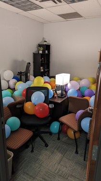My team filled my office with balloons and chairs while I was at an off-site meeting