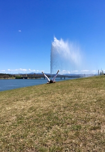 My tourist photo in Canberra Australia in front of the Captain Cook Memorial Jet on Lake Burley Griffin