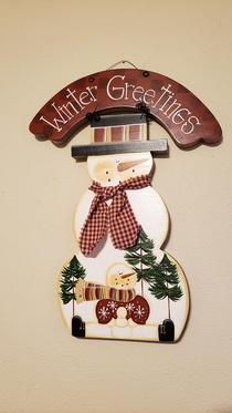 My wife and I bought this sign at a craft fair last week Just realized this morning that the snowman at the bottom is spread eagle and holding his snow penis
