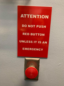 My wife found this in the womens restroom at a travel center No explanation of what it does no context as to what constitutes an emergency It was next to the hand driers She said she never wanted to push a red button more in her life Also there was not on