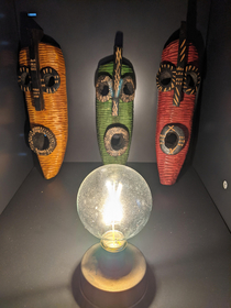 My wooden masks see artificial light for the first time