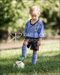 My  year old was NOT feeling his team soccer photo this year