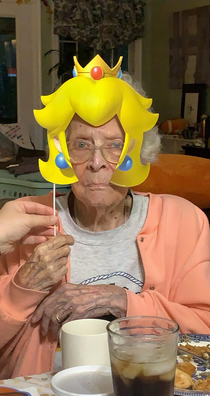 My  yo grandma getting into the Mario birthday theme