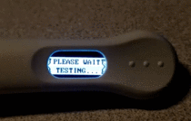 Never Gonna Give You Up playing on a digital pregnancy tester
