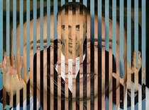 Nicholas Cage in a Nicholas Cage cage