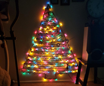 No room for a tree Spend  hours pinning and re-pinning a stand of multicolored lights to the wall to get the whole strand to fit perfectly