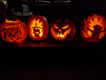 Not sure if this really counts for this sub but I find a few of our pumpkins for this Halloween funny