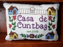 On an online forum frequented by my wife and me one troll dubbed my wife a cunt and myself a douchebag When we bought our first house together one of our friends gave us this lovely cross stitch as a housewarming present