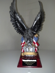 On my last day of managing a store and a week after receiving my first  up votes on a post my staff presented me with this trophy Its over a foot tall and majestic as fuck They will be missed