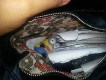 Opened my wifes purse and started laughing She asked what was so funny