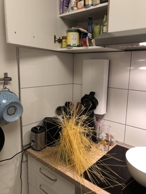 Opened the cupboard and the spaghetti just fell out like that I think I created a piece of art