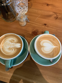 our barista tried to be arty and we just ended up with a his and hers falic coffee