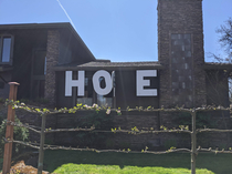 Our neighbors Hope sign broke in the best way possible