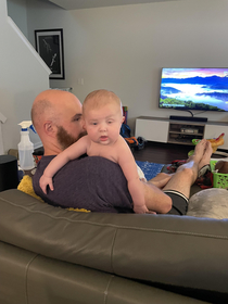 Our son watching my wife mix up his formula