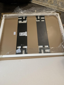 Packaging Matters - This is a mirror that is surrounded with squares We opened up the box to hang it up both looked at each other and then back at the box My husband says I think we got the wrong mirror