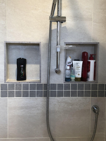 Parents got these cute alcoves in their new shower to store toiletries Guess which is Mums and which is Dads