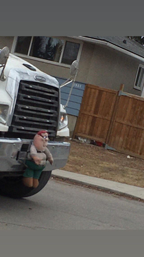 Peter Went on a walk today and saw this on the front of a garbage truck