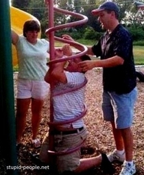 Pic #1 - Adults stuck in playground equipment