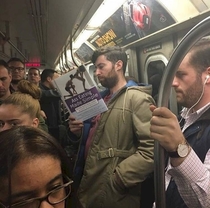 Pic #1 - Dude trolls people on subway with fake book covers