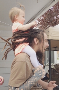 Pic #1 - Man uses dreads as a baby safety device