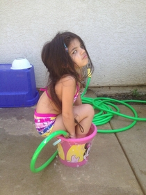Pic #1 - My little sister was complaining about wanting to swim but having no pool I found her in the backyard like this