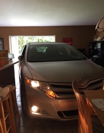 Pic #1 - My moms co-worker decided to park her car in her living room for the hurricane