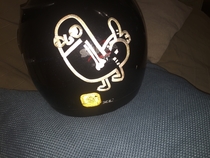Pic #2 - I got some black reflective tape and made a thing on my crash helmet