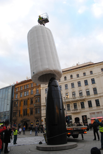 Placing the condom cover on unfamous astronomical clock in Brno Czechia