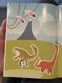 Playing with my toddler with a dinossaur sticker book Their expressions in this situation made me laugh a lot