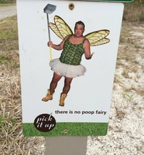 Poop fairy sign from the park Pick it up