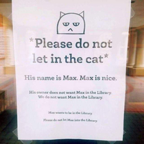 Poor Max  He probably just wants to read the latest Garfield book