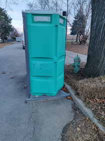 Porta potty needs a ticket for a parking violation