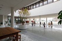 Preschool in Japan where rainwater is channeled in to a big old puddle for the kids to play in