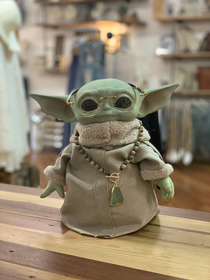 Put womens accessories on baby yoda and just ended up being a gangster librarian