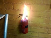 QUICK A fire extinguisher has caught fire in London England Somebody call   right away