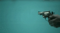 Revolver being shot underwater