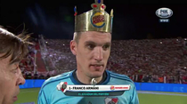 River Plate goalkeeper Franco Armani receives a paper crown for Man of The Match from competition sponsors Burger King