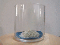 Sand art in a glass timelapse