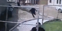 Security guard running from suicide bomber