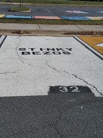 Seniors at this high school can decorate their parking spots with their own art or statements I thought this one was was pretty funny