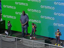Shaquille ONeil on the F podium