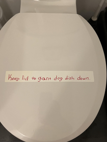 Sign on coworkers toilet I guess the dog likes drinking from the fountain of youth