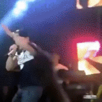 singer nails a phone catch on stage bonus points for style