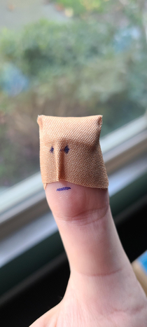 Sliced my finger open Realized after putting on the bandaid that it looked like a lame superhero