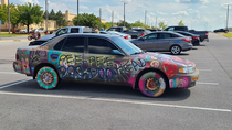 So getting off work today and this car was in the parking lot On the back it says eye sore