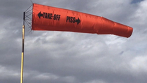 so my dad ordered a custom windsock for his airport and it reflects his sense of humor perfectly