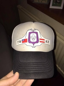 So my son got back from a scout Jamboree in Austria One of the scouts he met from Taiwan kindly gave him this hat with the Taiwan and Austrian flag on He wants to give it to his little brother for a present Im not so sure