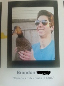 So this guy in my yearbook is holding a duck with a remarkable quote